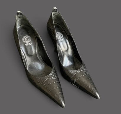 VERSACE 
Pair of black leather pumps with...