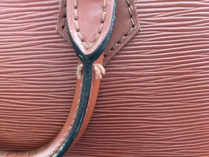 Louis VUITTON, circa 1996
Alma bag in camel-colored...