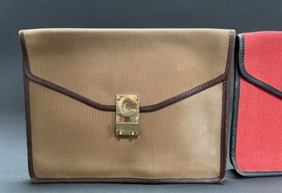 CELINE 
Set of three 25-cm canvas and leather...