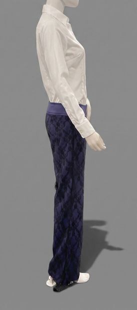 MELO E GRANO 
Burgundy pants accented with...
