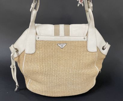 PRADA
40 cm tote bag in beige raffia, white...