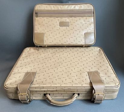 LANCEL
Two suitcases in coated canvas and...