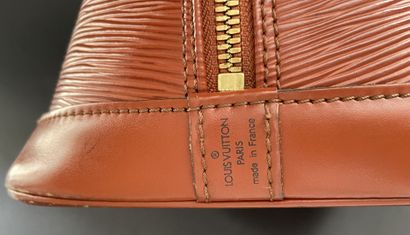 Louis VUITTON, circa 1996
Alma bag in camel-colored...