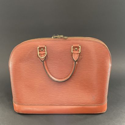 Louis VUITTON, circa 1996
Alma bag in camel-colored...