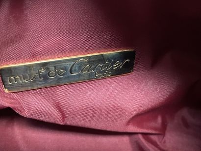 MUST by CARTIER
Burgundy grained leather...