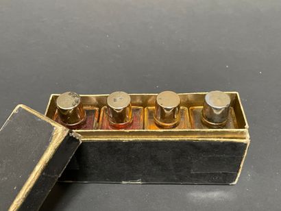 BURDIN PARIS
Four small bottles of perfume:...