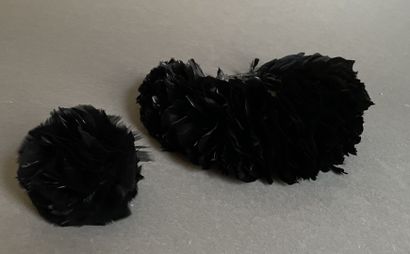 Black feather ornament and pompom.