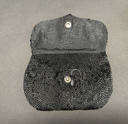 ANONYMOUS
Set of three beaded pouches, one...