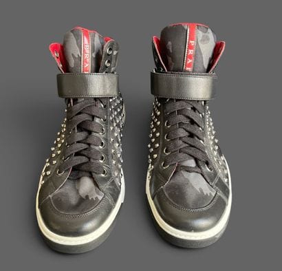 PRADA
Pair of high-top sneakers in camouflage...