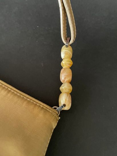 Christian DIOR
Beige nylon bag with magnetic...