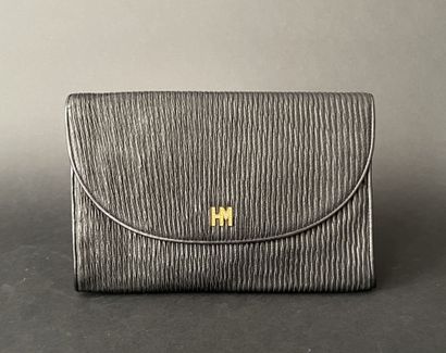 Hanaé MORI
25-cm clutch in black embossed...