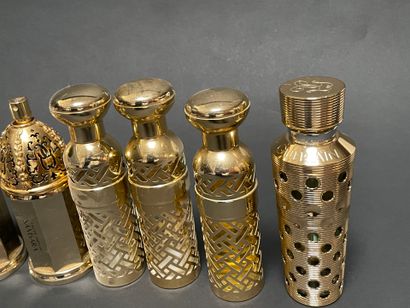 GUERLAIN
Set of spray bottles and empty ...