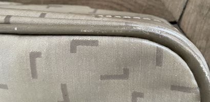 LANCEL
Two suitcases in coated canvas and...