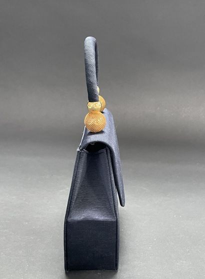 Gianni VERSACE and ANONYMOUS
Set of two bags:
-...