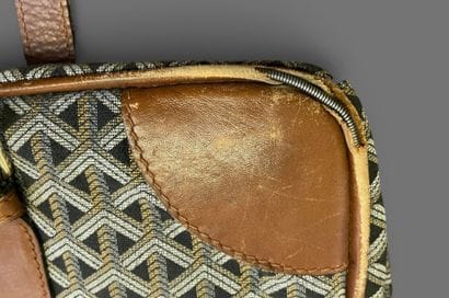 GOYARD attributed to
Set in camel leather...