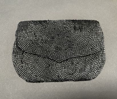 ANONYMOUS
Set of three beaded pouches, one...