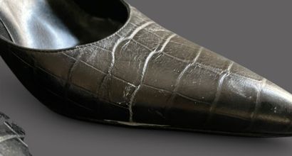 VERSACE 
Pair of black leather pumps with...