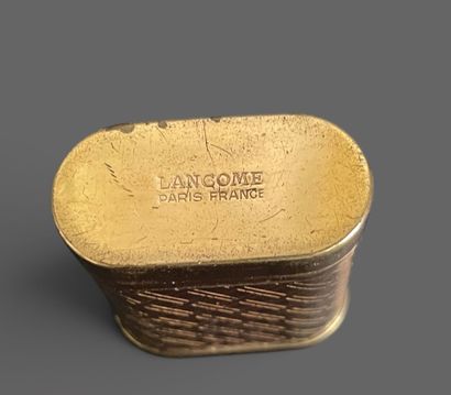 Belt buckle featuring a coiled snake design...