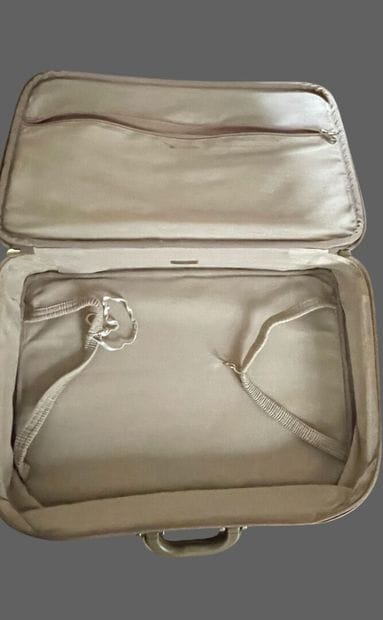 LANCEL
Two suitcases in coated canvas and...