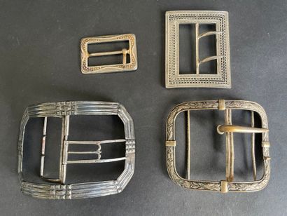 Set of six metal belt buckles, including...