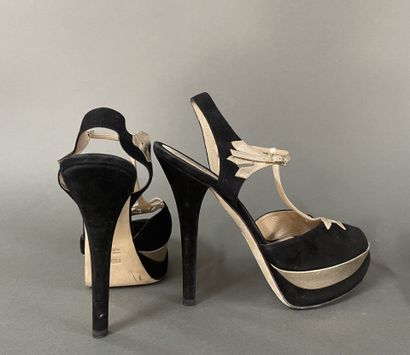 FENDI 
Set of two pairs of pumps: one in...