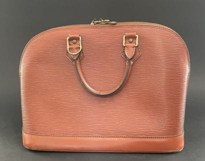 Louis VUITTON, circa 1996
Alma bag in camel-colored...