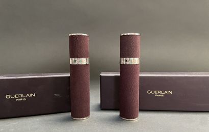 GUERLAIN
Two fabric-covered metal perfume...