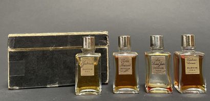 BURDIN PARIS
Four small bottles of perfume:...