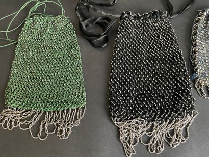 Set of six purses and pouches decorated with...