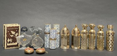 GUERLAIN
Set of spray bottles and empty ...