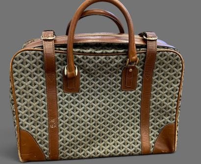 GOYARD attributed to
Set in camel leather...