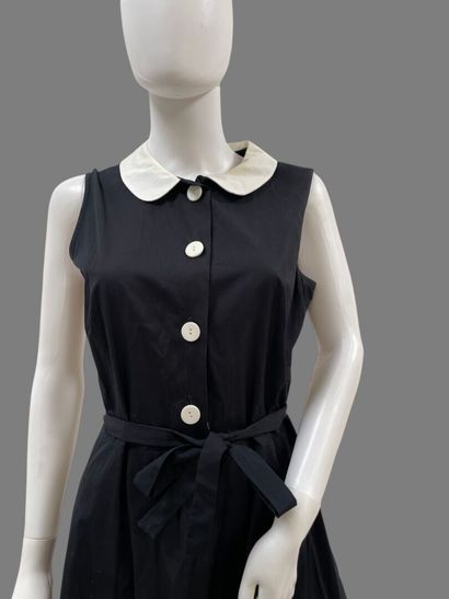 AGNES B. 
Long, sleeveless black cotton dress...