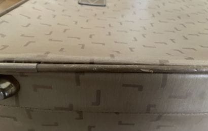 LANCEL
Two suitcases in coated canvas and...