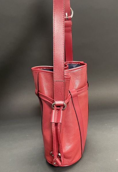 LANCEL
Red embossed leather bucket bag with...