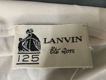 LANVIN SUMMER 2015 
Asymmetrical beige sleeveless...