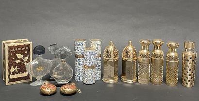 GUERLAIN
Set of spray bottles and empty ...