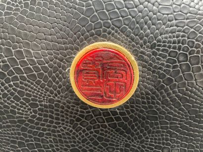 KENZO
21-cm bag made of reptile-embossed...