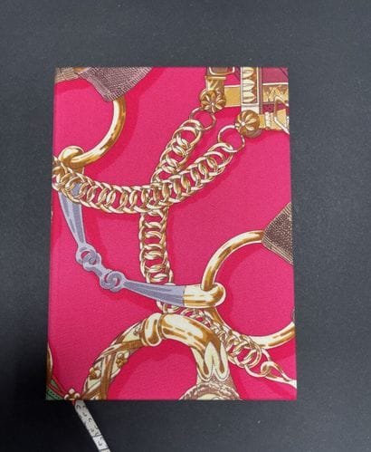 HERMES Paris
Printed silk notebook
In very...
