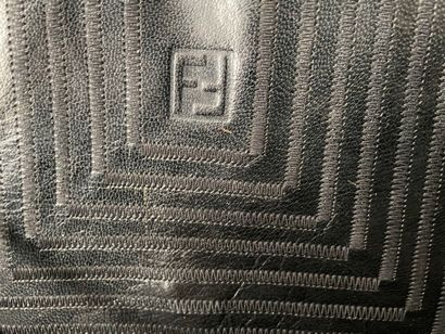 FENDI 
Small flat leather bag with black...