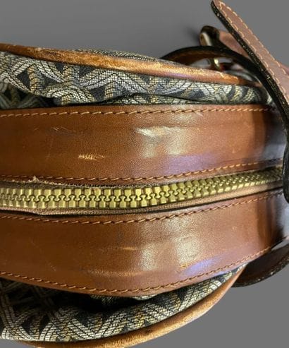 GOYARD attributed to
Set in camel leather...