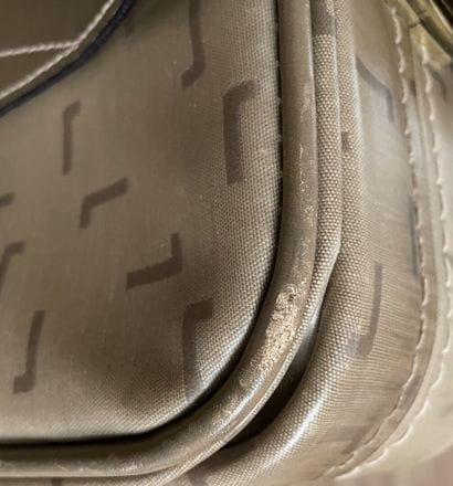 LANCEL
Two suitcases in coated canvas and...