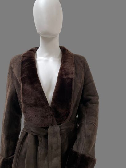LOEWE
Brown shearling coat with a shawl collar...