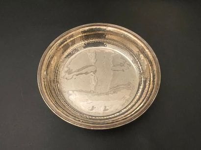 Christian DIOR
Two hammered silver plated...