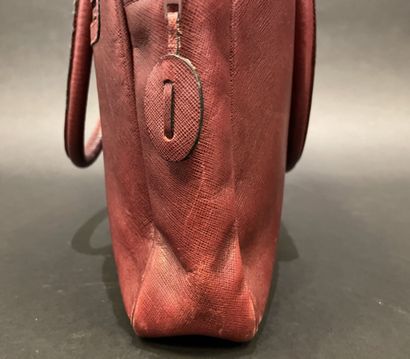 LANCEL 
Burgundy leather briefcase, double...