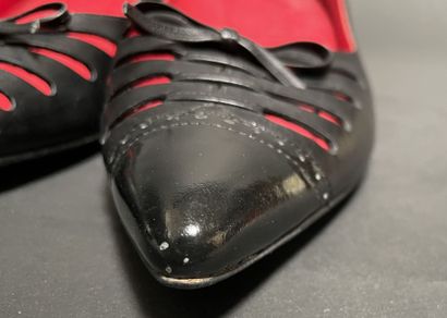 CELINE
Pair of black leather pumps with a...
