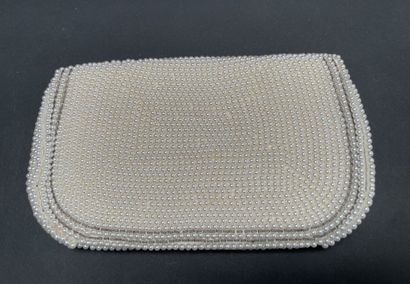 ANONYMOUS
Set of three beaded pouches, one...