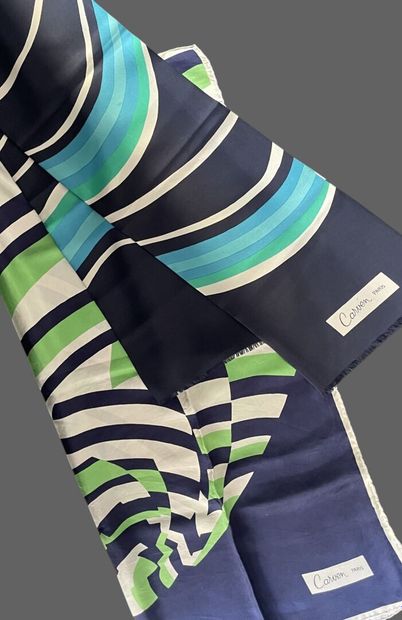 CARVEN 
A silk scarf and a silk shawl in...