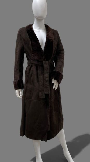 LOEWE
Brown shearling coat with a shawl collar...