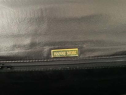 Hanaé MORI
25-cm clutch in black embossed...