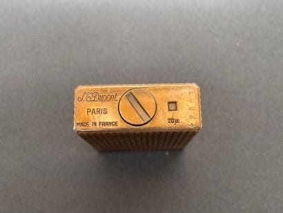 S.T. DUPONT
Gold-plated lighter with diamond-point...